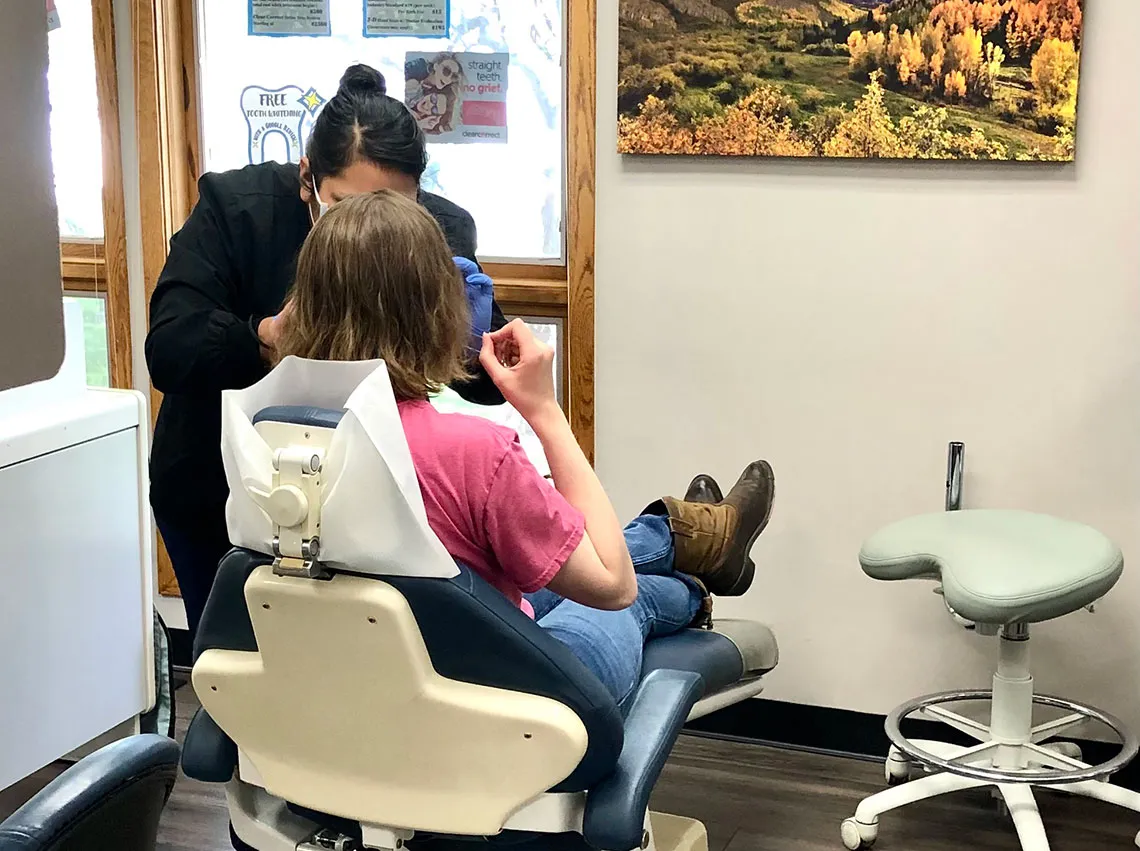 A patient relaxing in the dental chair at Ascent Family Dental